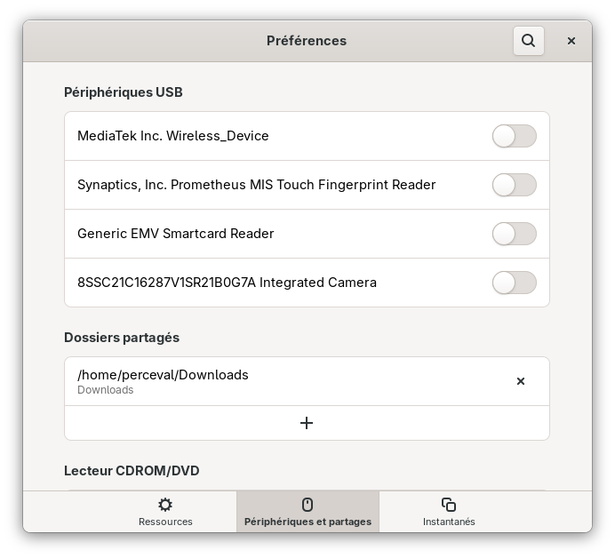 Gnome Boxes preferences menu showing peripheral and sharing options